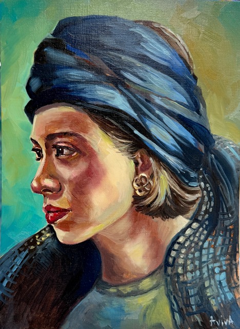 Profile portrait of a woman in a blue headscarf