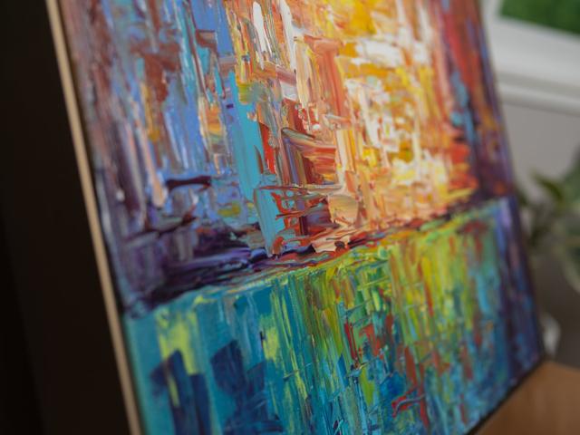 Detail of warm impasto sunset painting