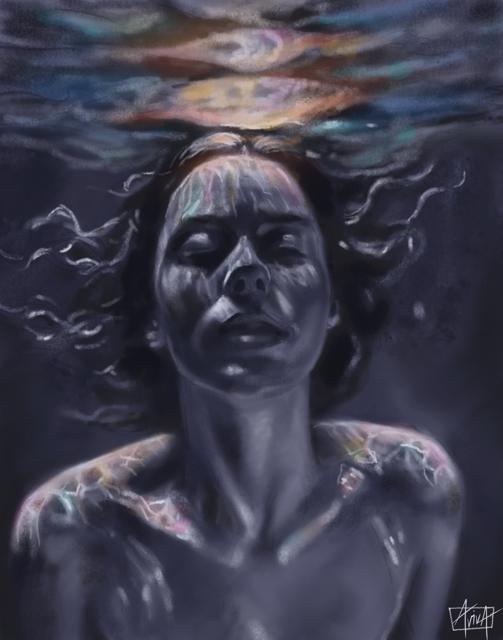 A face looking up from underwater at colorful reflections on the surface