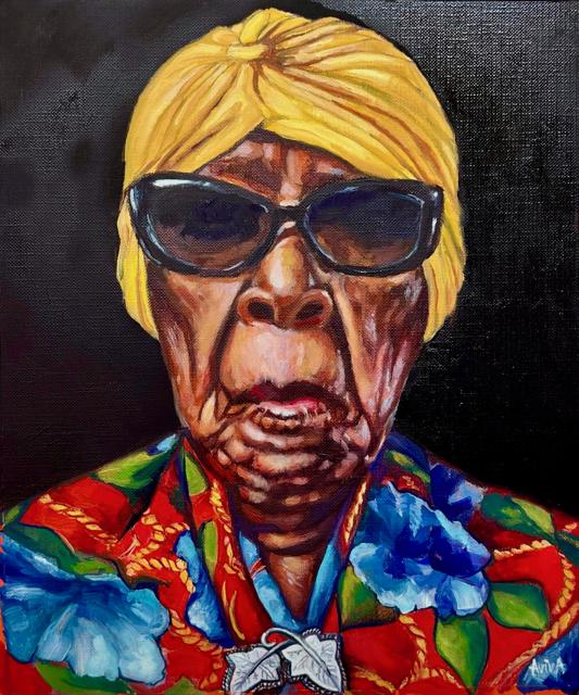 Portrait of a woman in sunglasses and a floral shirt